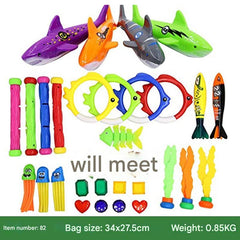 Children enjoying colourful diving sticks at the pool