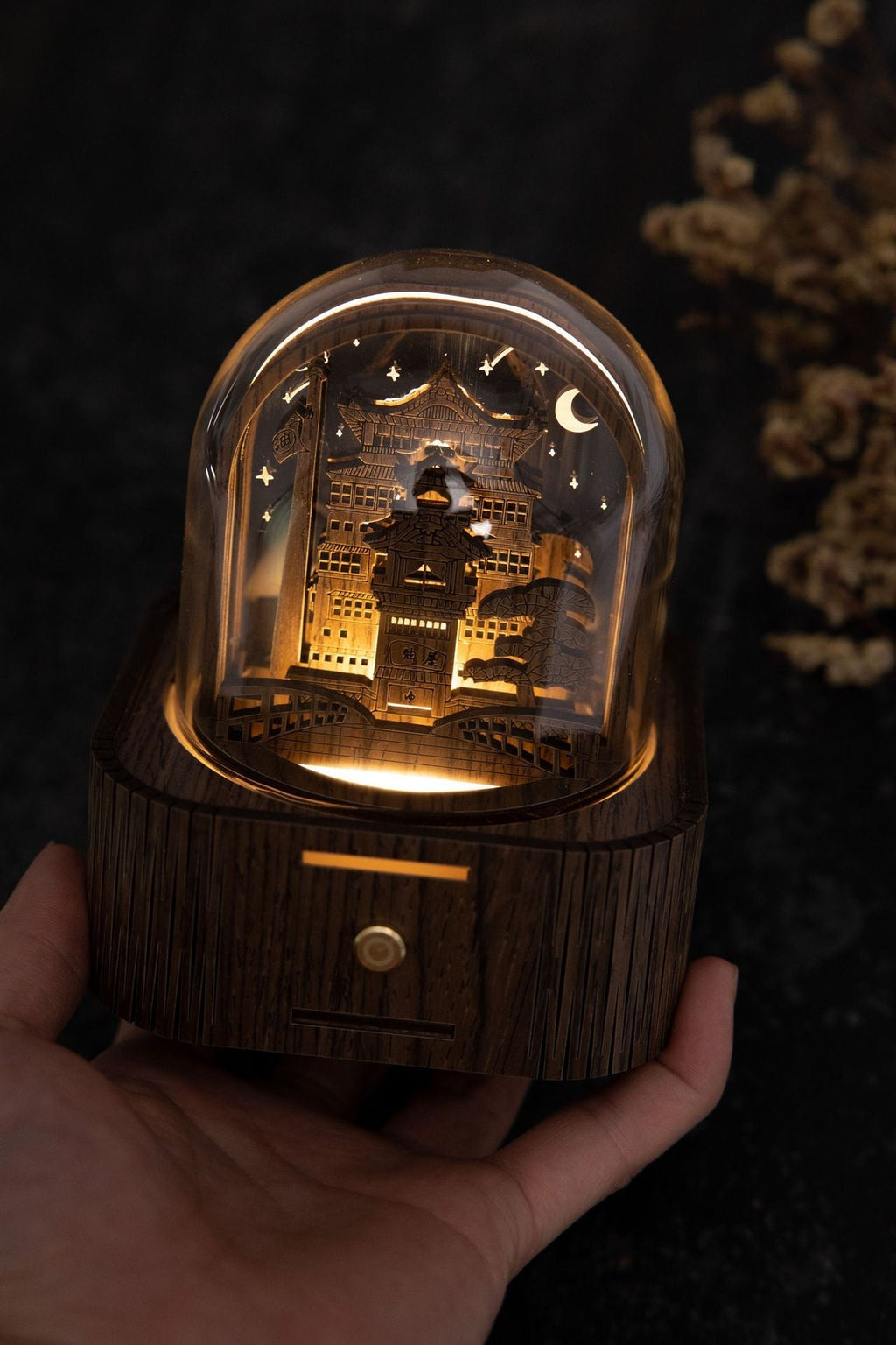 Whimsical Hogwarts night light in dark setting