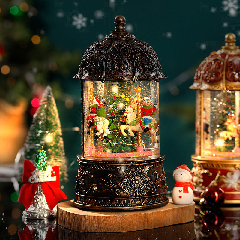 Musical carousel with Santa snow globe decoration