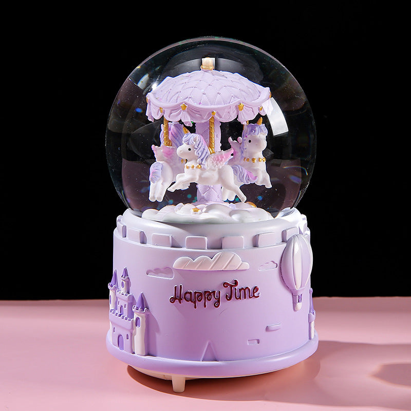 Detailed resin carousel decoration on music box