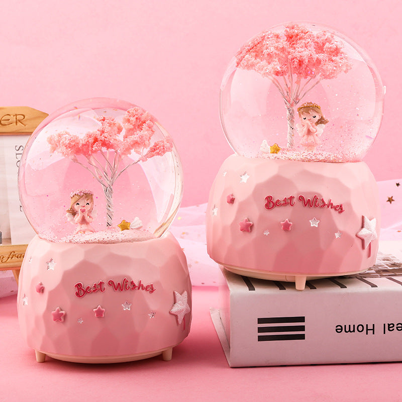 Top view of cherry blossom angel music box