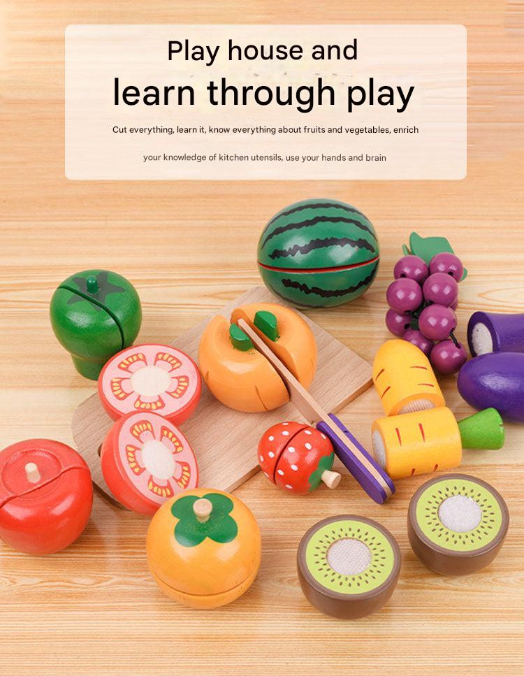 Child playing with magnetic wooden vegetable playset