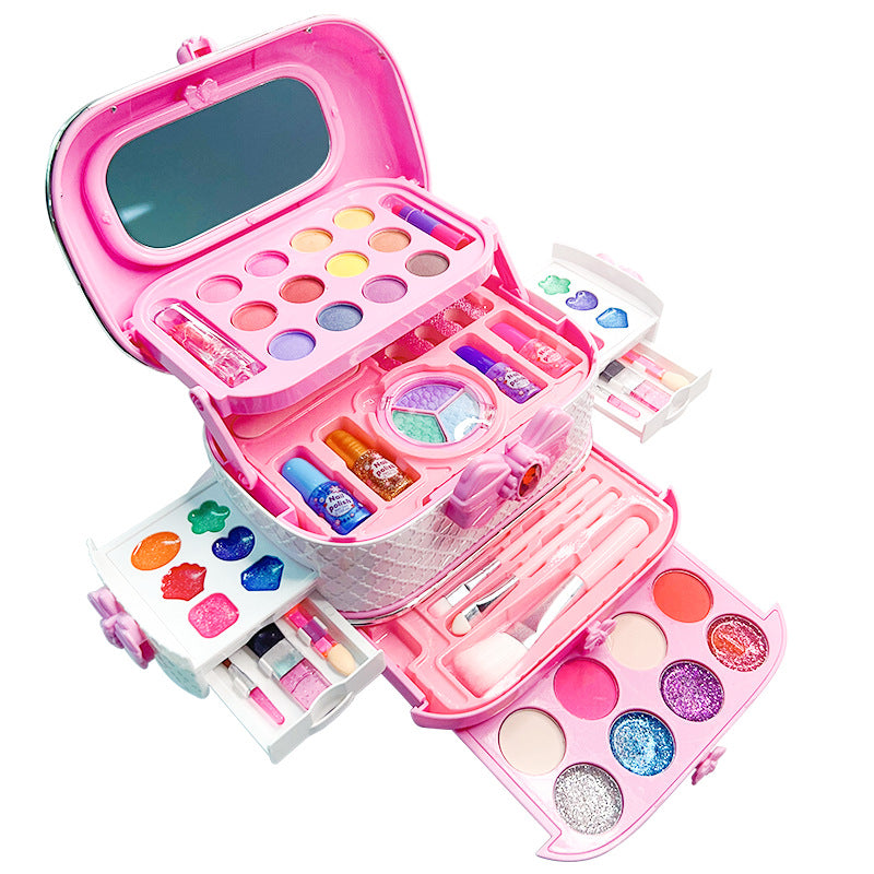 Kids pretending to use their makeup set