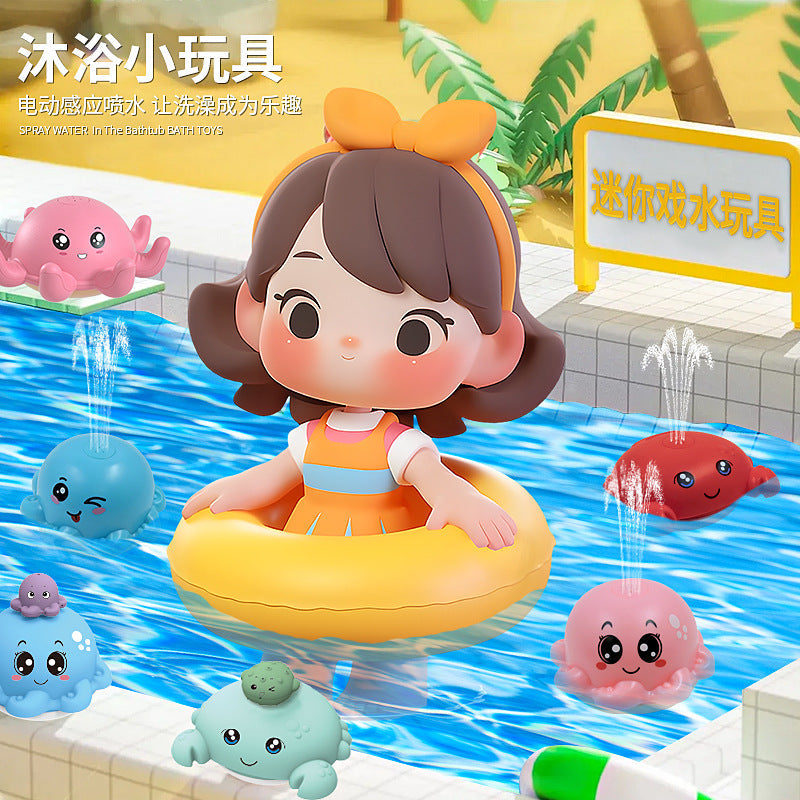 Octopus bath toy spraying water and lighting up