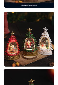 Miniature green Santa snow globe decoration