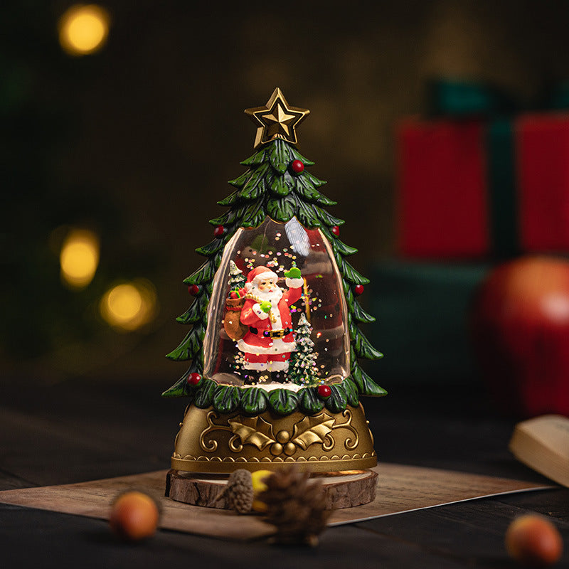 Snow globe showing Santa in a winter scene
