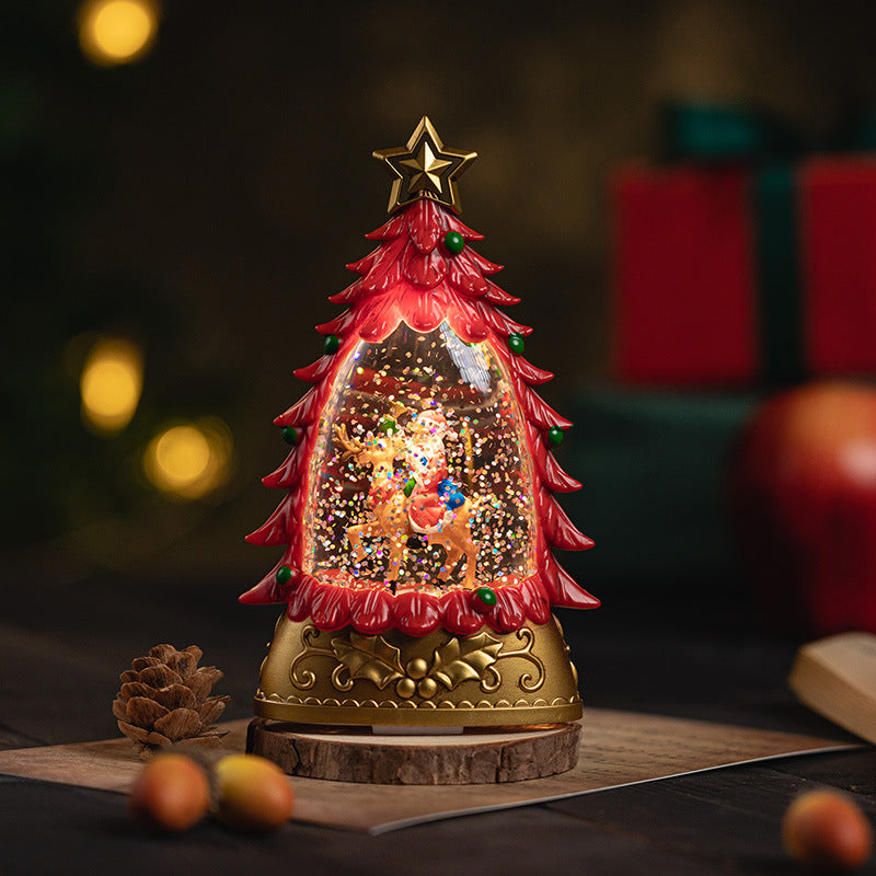 Miniature green Santa snow globe decoration