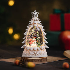 Festive snow globe with falling artificial snow