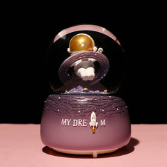 Astronaut snow globe displaying vibrant colours