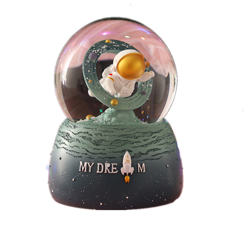 LED illuminated astronaut snow globe decoration