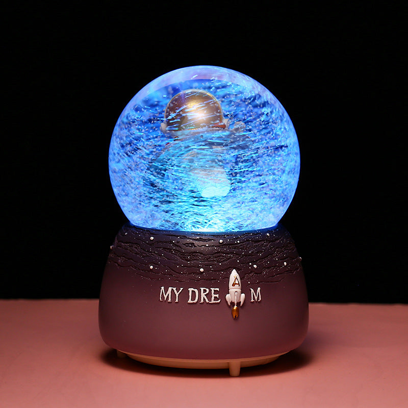 Astronaut music box with hand-painted detail