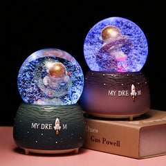 Cosmic-themed music box with LED effect