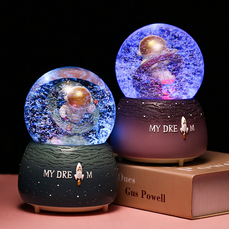 Cosmic-themed music box with LED effect