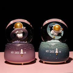Vibrant coloured lights in snow globe