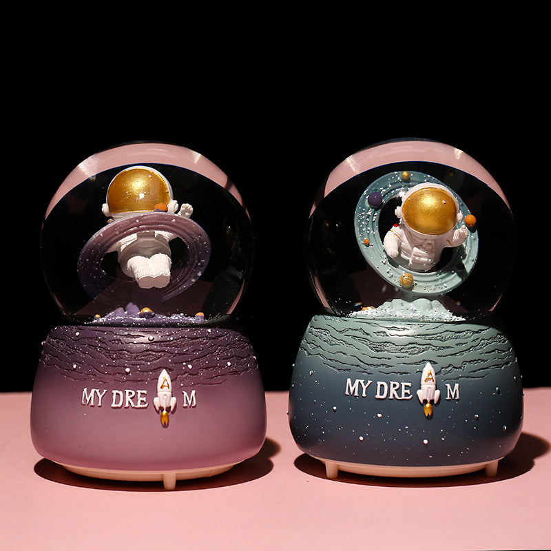 Vibrant coloured lights in snow globe