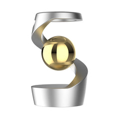 metallic spinning top toy displayed