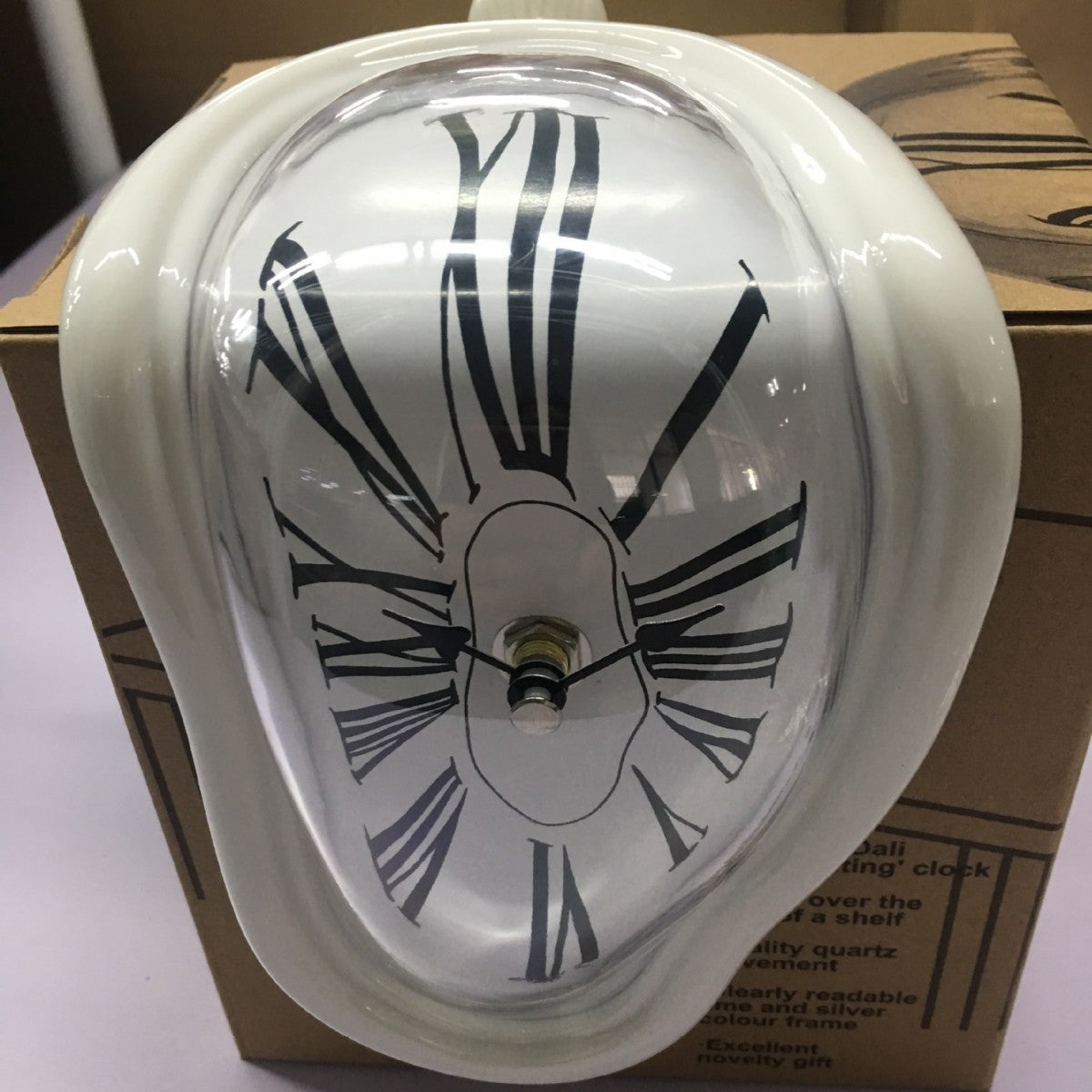 Room decor displaying modern melting clock