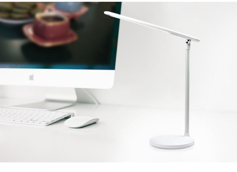 LED desk lamp complementing workspace
