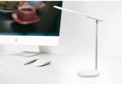LED desk lamp complementing workspace
