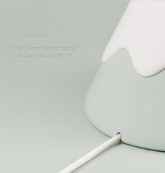 Green LED mountain lamp providing ambient light