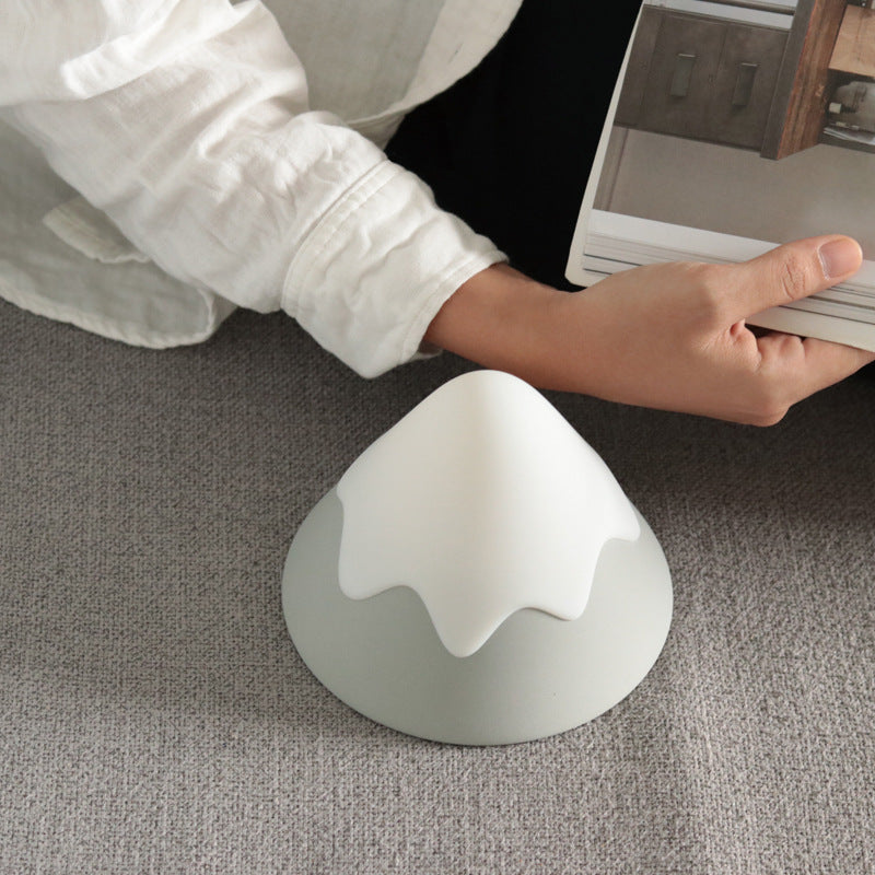Green LED mountain lamp providing ambient light
