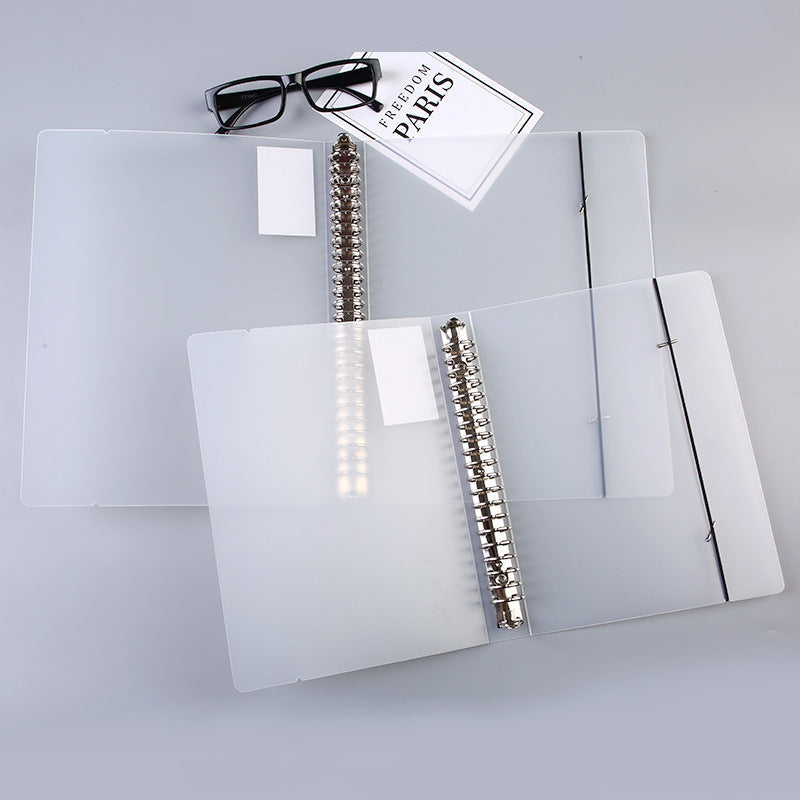 Close-up of notebook binder mechanism