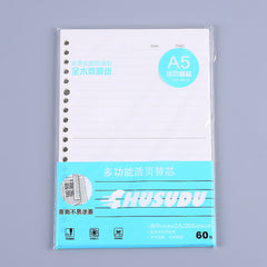 Open A5 binder notebook on table