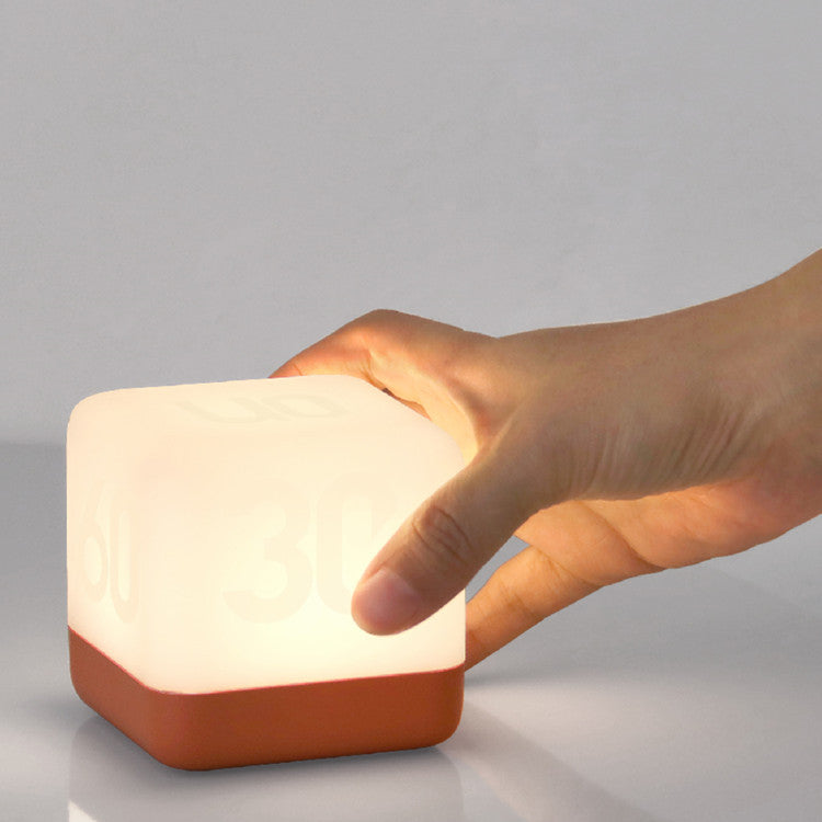 USB rechargeable LED cube nightlight on desk
