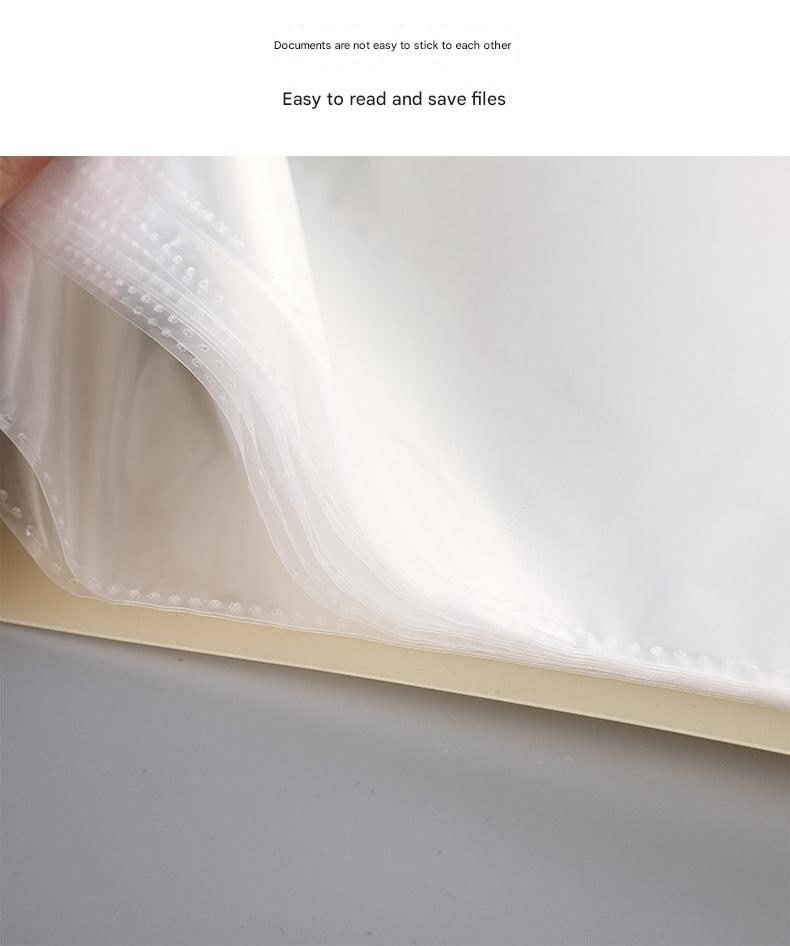 Close-up of folder clasps securing documents