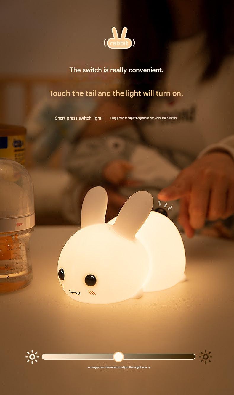 rabbit-shaped night light on bedside table