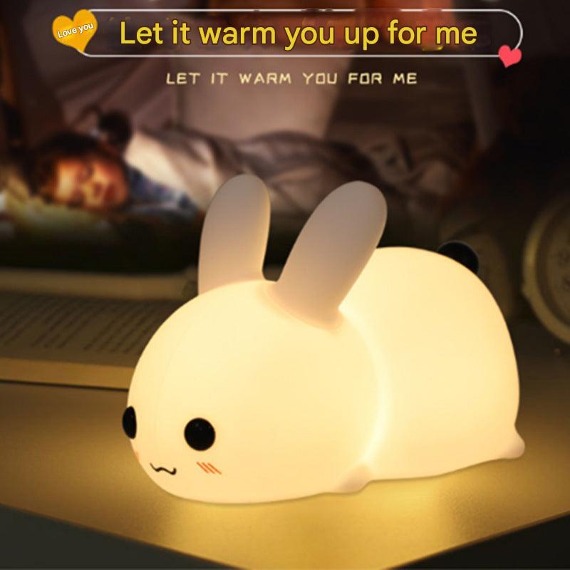 rabbit-shaped night light on bedside table