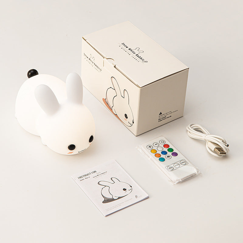 interactive silicone rabbit night light in a child's room
