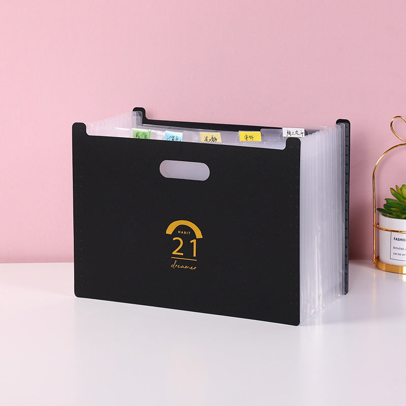 black accordion folder with custom labels