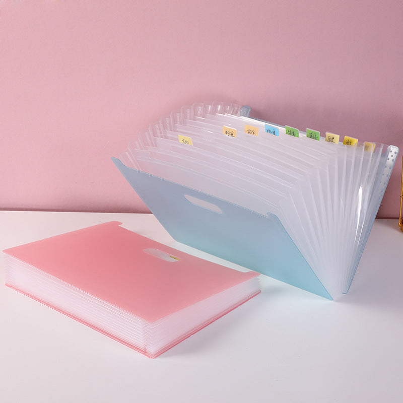 pink student organiser with papers