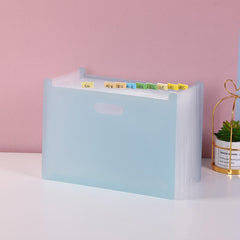 rainbow design accordion folder in use