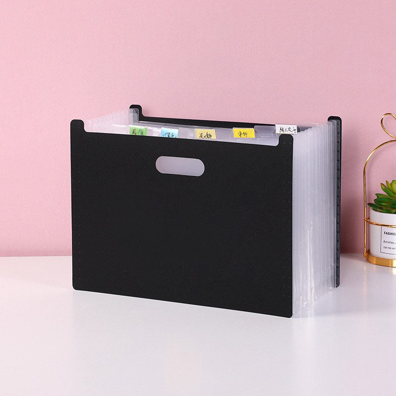 close-up of blue accordion folder compartments