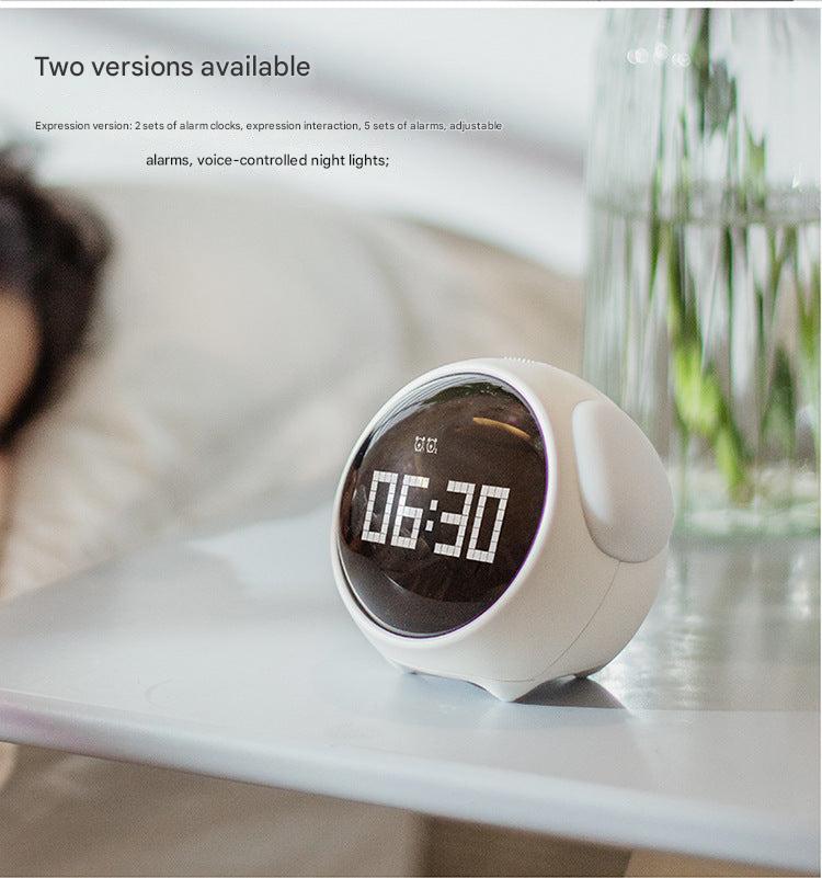 Kids alarm clock with thermometer feature