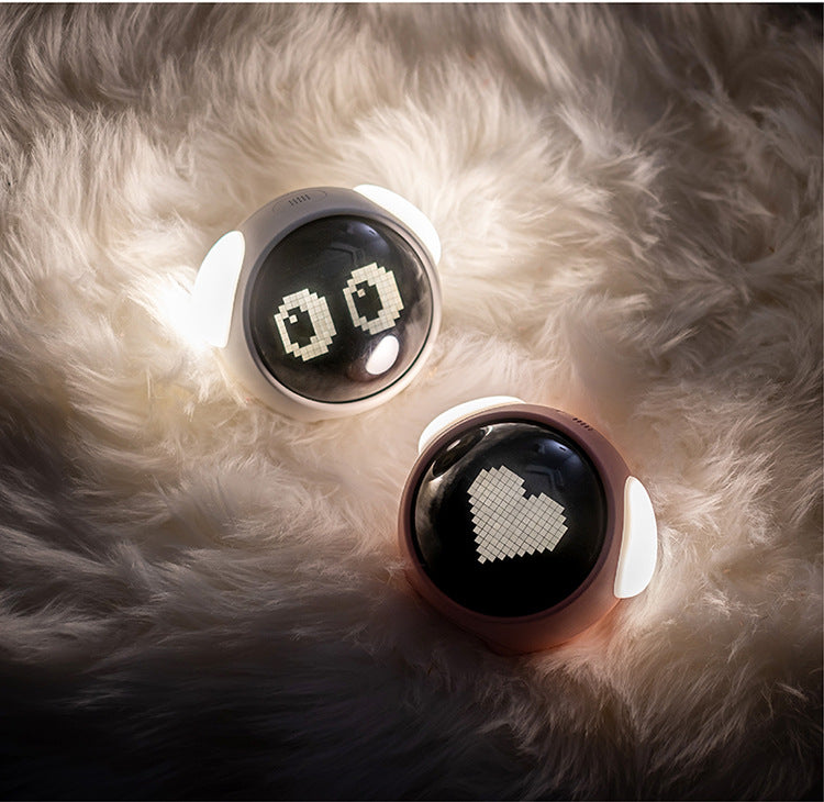 Kids alarm clock with thermometer feature