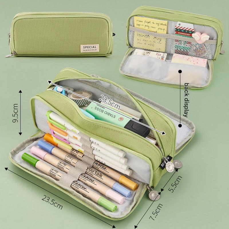 Angoo pencil case in matcha green partially open