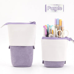 Set of colourful pencil cases on desk