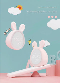 Pink bunny digital clock at night