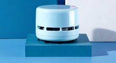 Compact Electric Mini Vacuum Cleaner in various environments