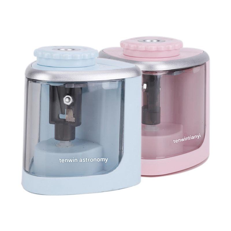 Close-up of pencil being sharpened in electric sharpener