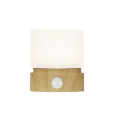 Compact style modern night light on bedside table
