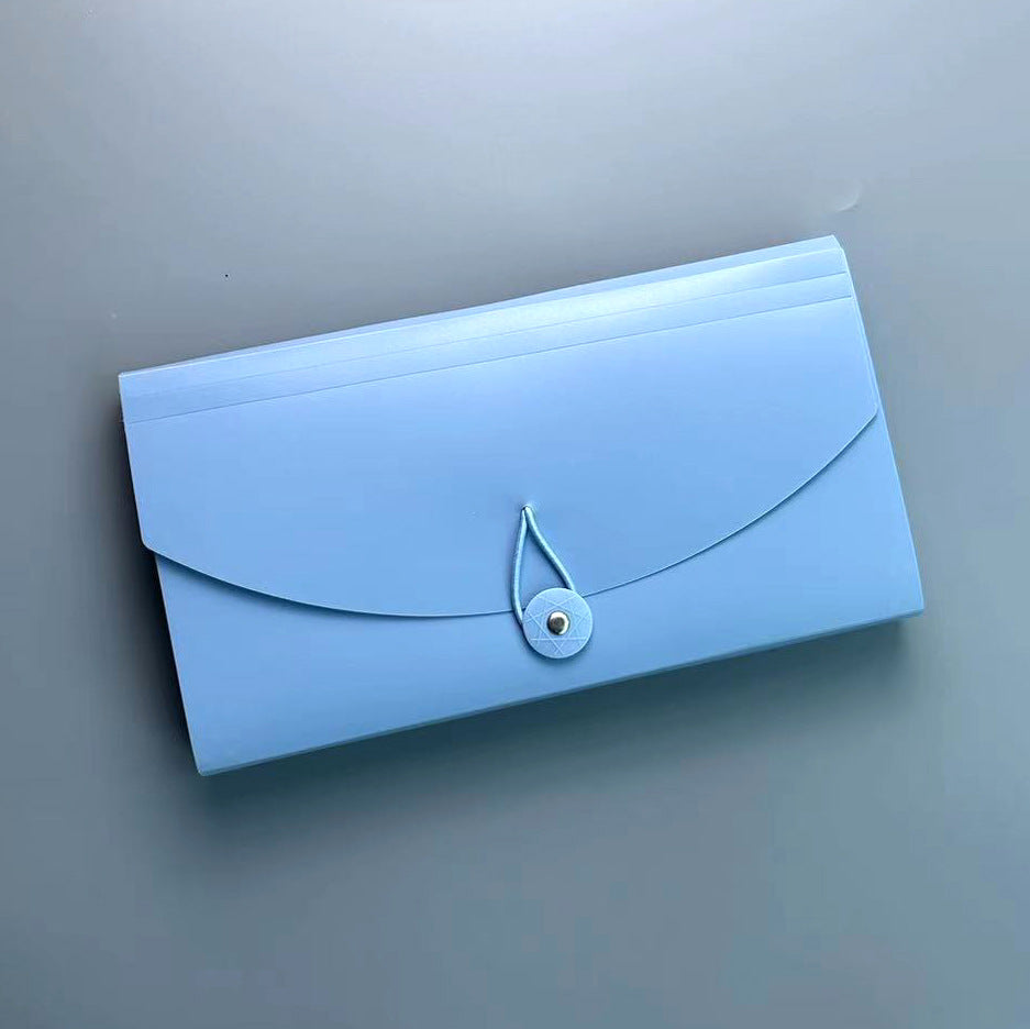 Close-up of multi-pocket file organiser in vibrant colours