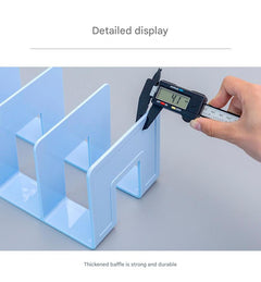 close-up view of multiple slots in acrylic book stand