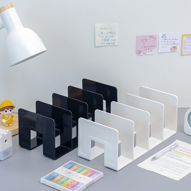 close-up view of multiple slots in acrylic book stand