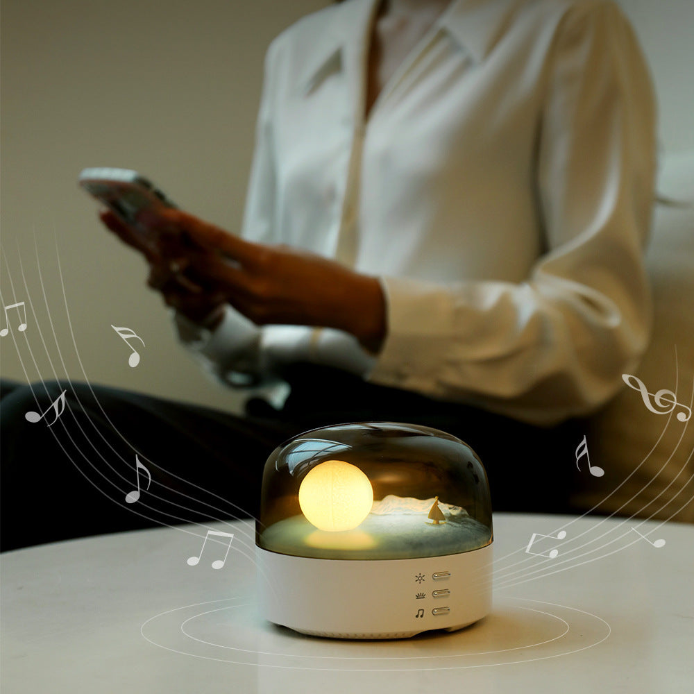 Side view of the pink night light Bluetooth speaker