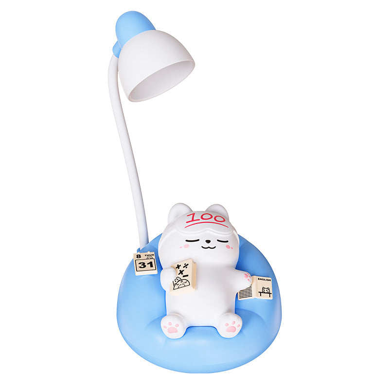 Close-up of cute cat lamp illuminating a room