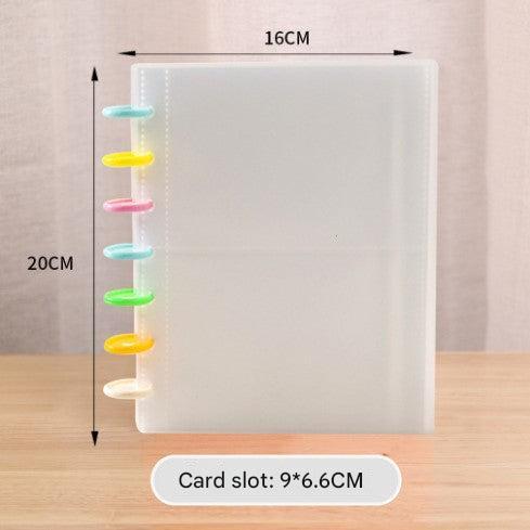 A4 photo album open showing 120 card slots